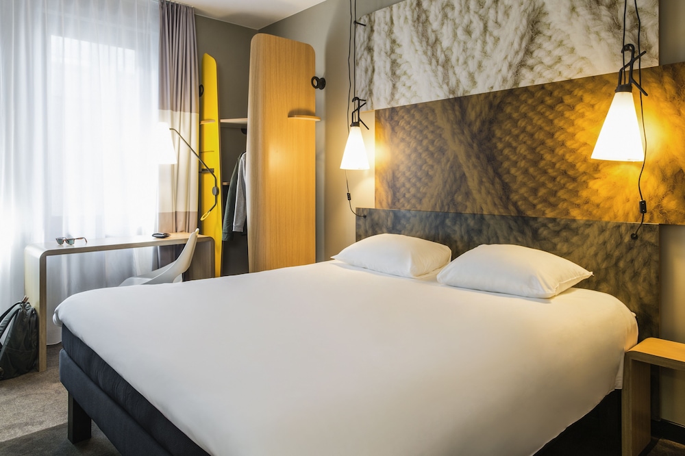 Habitación Standard con una cama doble del hotel Ibis Lyon Caluire Cité Internationale. Foto 4