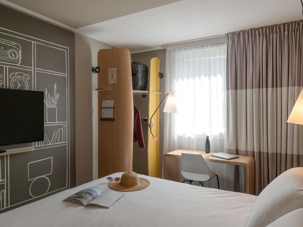 Habitación Standard con una cama doble del hotel Ibis Lyon Caluire Cité Internationale. Foto 5