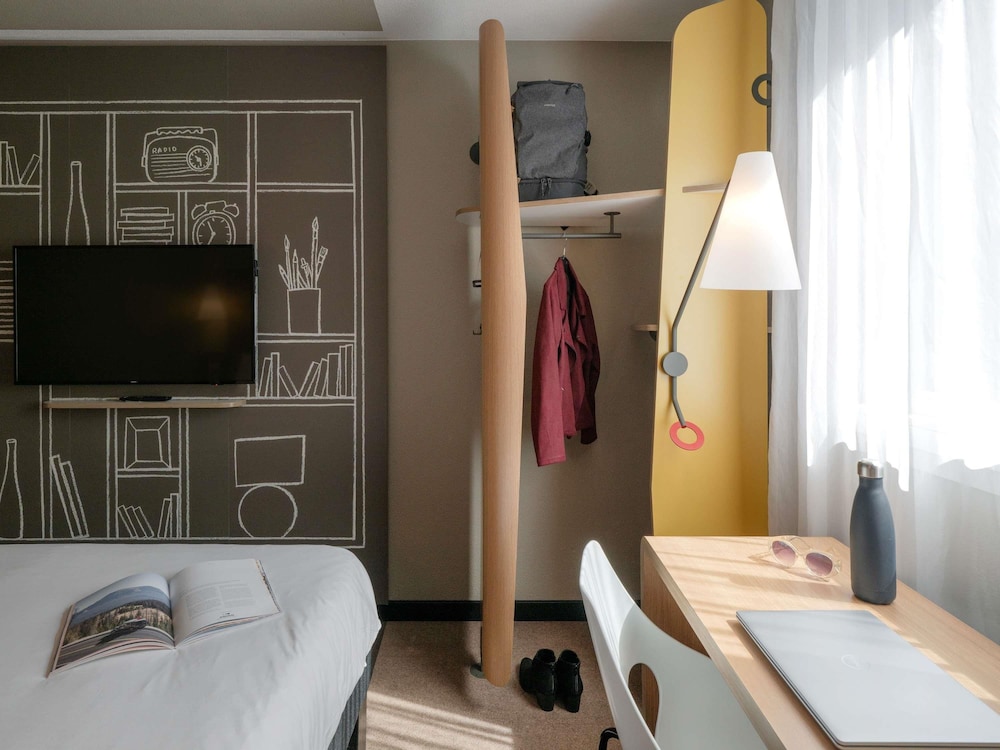 Habitación Standard con una cama doble del hotel Ibis Lyon Caluire Cité Internationale. Foto 6