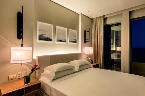 Habitación con vistas al océano y acceso al club - Cama extragrande del hotel Grand Hyatt Rio De Janeiro. Foto 9