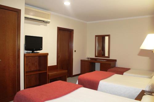 Habitación Triple Básica del hotel Villa De Marin