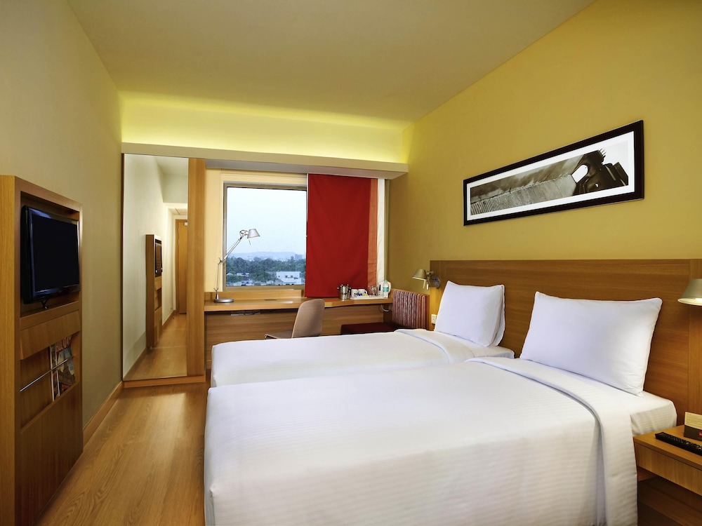 Habitación estándar con 2 camas individuales del hotel Ibis Bengaluru City Centre. Foto 5