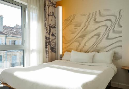 Habitación Cuádruple del hotel B&B Marseille Centre La Joliette. Foto 8