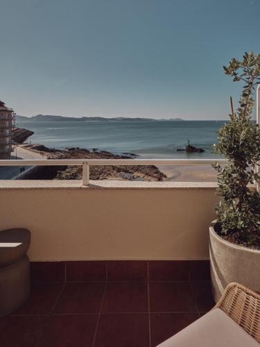 Habitación Doble con balcón y vistas al mar del hotel Atlante Sanxenxo Boutique. Foto 8