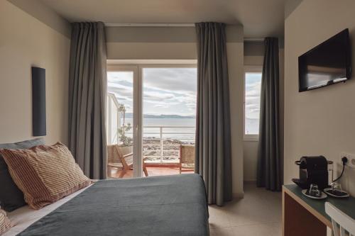 Habitación Doble Superior con vistas al mar - 1 o 2 camas del hotel Atlante Sanxenxo Boutique. Foto 10