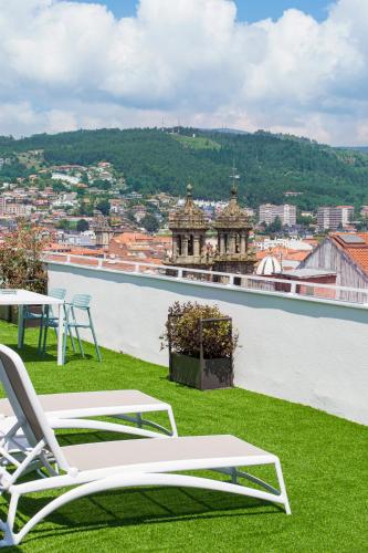 Habitación Doble Deluxe con balcón y vistas al mar del hotel Rias Bajas. Foto 8