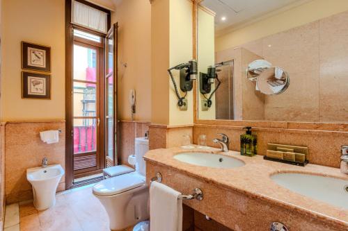 Grand Deluxe Room with balcony del hotel Casa Romana Boutique. Foto 1