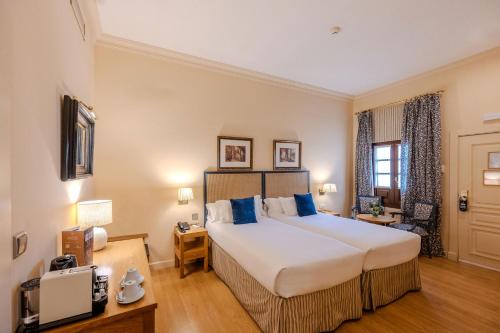 Habitación Deluxe del hotel Casa Romana Boutique. Foto 3