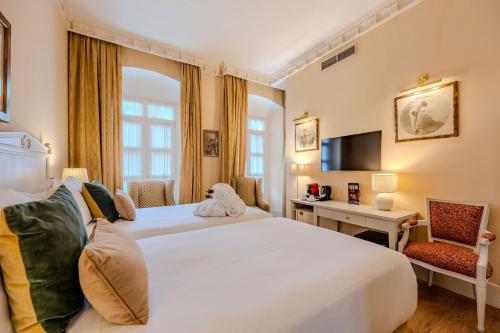 Grand Deluxe Room with balcony del hotel Casa Romana Boutique. Foto 8