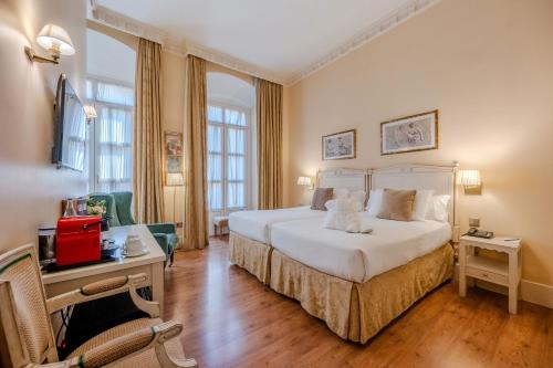 Habitación Familiar Deluxe comunicada del hotel Casa Romana Boutique. Foto 3