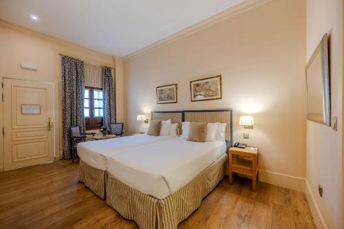 Habitación Deluxe del hotel Casa Romana Boutique. Foto 4