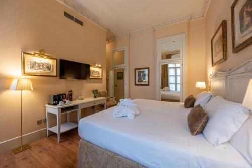 Habitación Familiar Deluxe comunicada del hotel Casa Romana Boutique. Foto 1