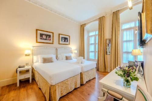 Habitación Familiar Deluxe comunicada del hotel Casa Romana Boutique. Foto 3