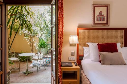 Habitación Deluxe con patio privado del hotel Casa Romana Boutique