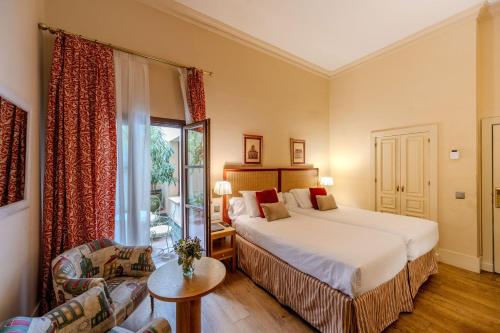 Habitación Deluxe con patio privado del hotel Casa Romana Boutique. Foto 1