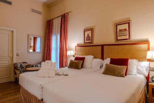 Habitación Deluxe con patio privado del hotel Casa Romana Boutique. Foto 4