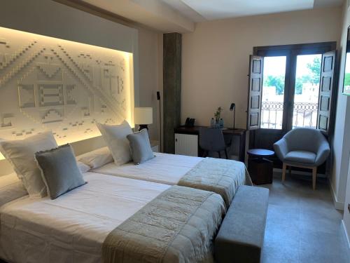 Habitación Deluxe del hotel Hacienda Del Cardenal. Foto 1