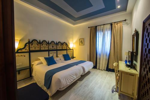 Habitación Triple del hotel Hacienda Del Cardenal