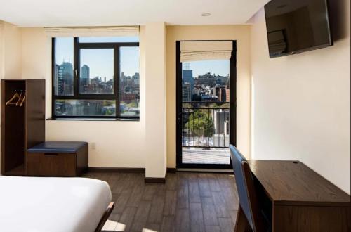 Habitación Doble con balcón del hotel Orchard Street Hotel