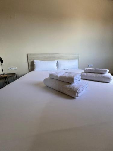 Habitación Doble Económica con cama supletoria del hotel Az Orús Factory. Foto 1