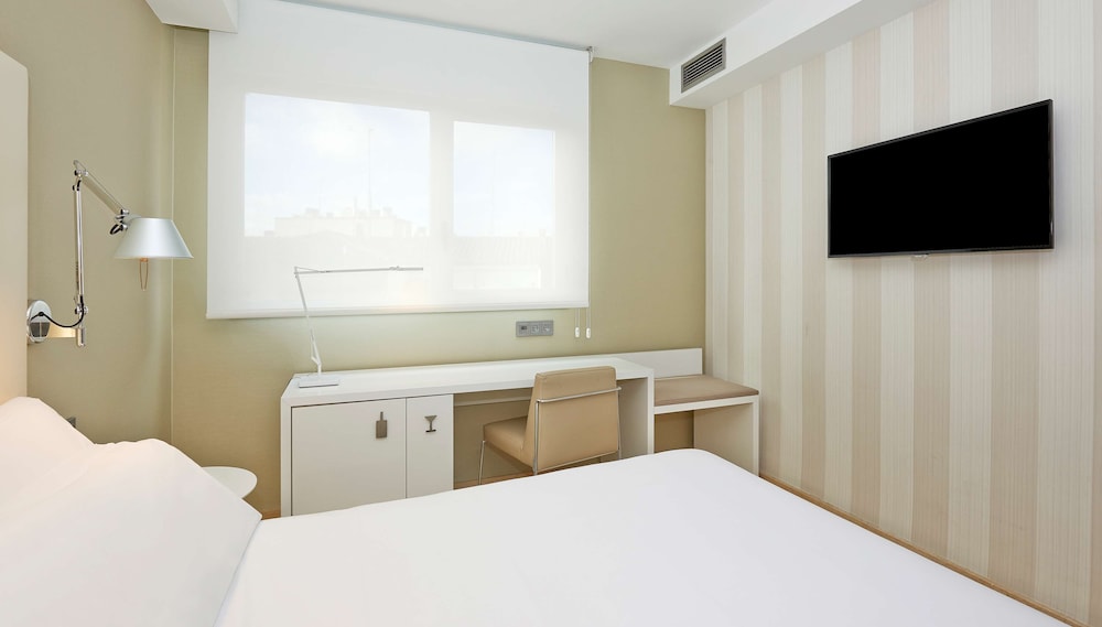 Habitación familiar (Adjoining Room, 3AD+1CH) del hotel Nh Ciudad De Zaragoza. Foto 3