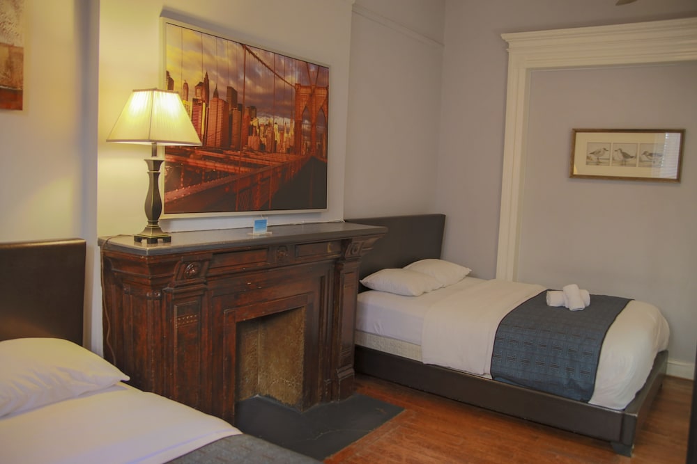 Habitación cuádruple estándar, baño compartido (Sleeps Four - Shared Bath) del hotel The Central Park North. Foto 3