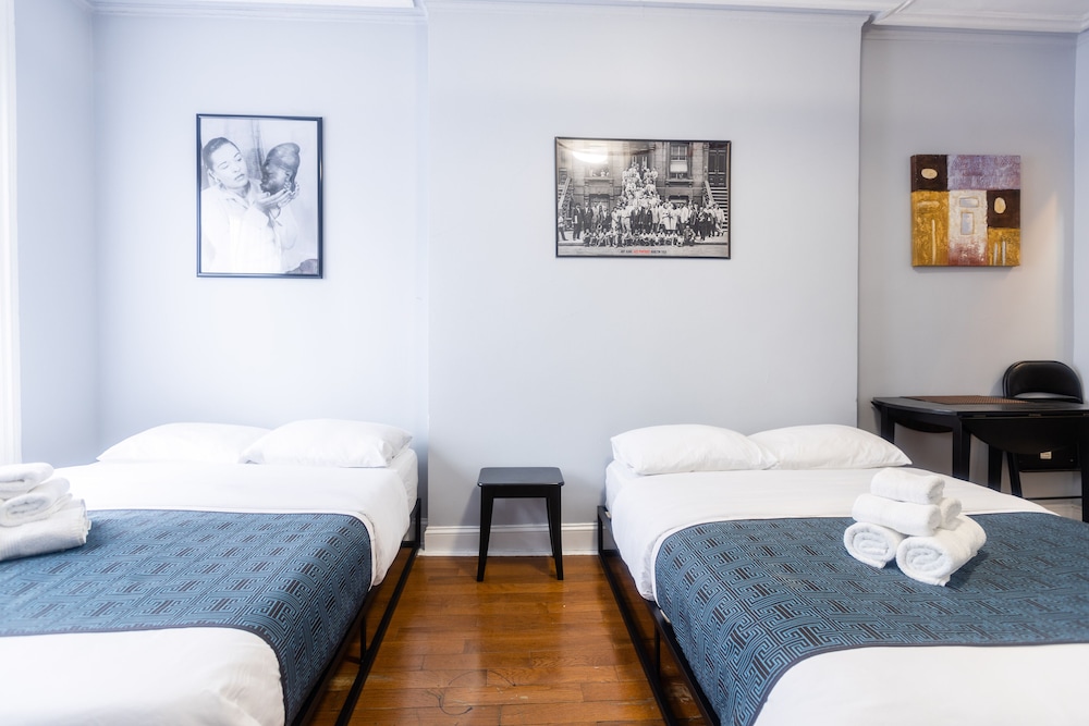 Habitación cuádruple estándar, baño compartido (Sleeps Four - Shared Bath) del hotel The Central Park North. Foto 9