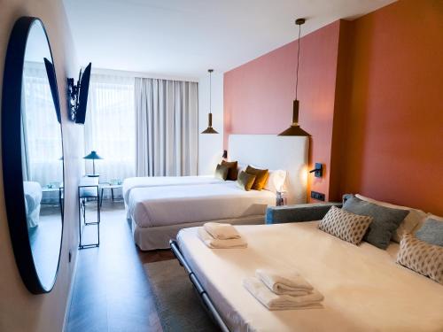 Habitación Familiar Deluxe del hotel Tribu Malasaña. Foto 8