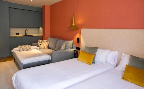 Habitación Familiar Deluxe del hotel Tribu Malasaña. Foto 9