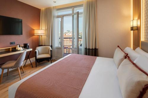 Habitación Doble Superior con balcón del hotel Catalonia Plaza España & Spa. Foto 4