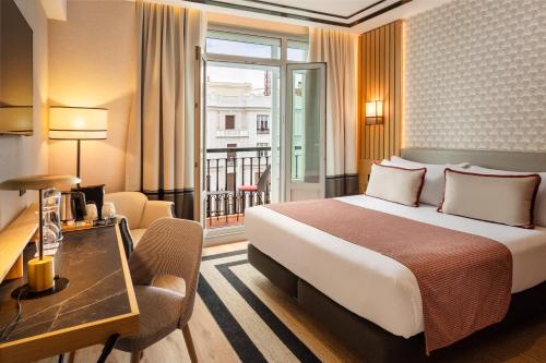 Habitación Doble Superior con balcón del hotel Catalonia Plaza España & Spa. Foto 6