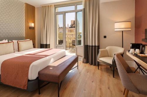 Habitación Doble Superior con terraza del hotel Catalonia Plaza España & Spa. Foto 3