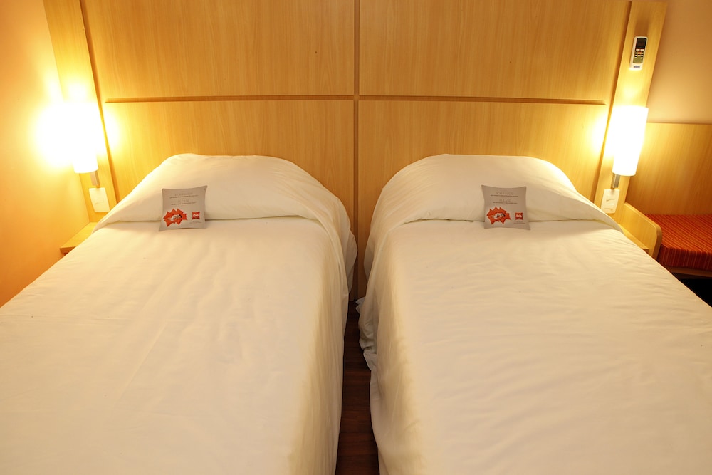 Habitación estándar con 2 camas individuales, 2 camas individuales del hotel Ibis Belo Horizonte Afonso Pena. Foto 2