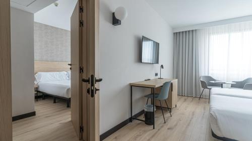 Habitación Familiar (2 habitaciones comunicadas) del hotel Blanca De Navarra. Foto 1