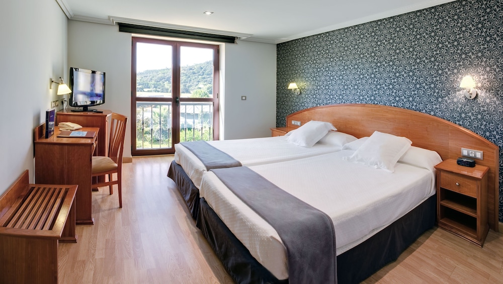 Habitación Triple del hotel Spa Villa Pasiega. Foto 2