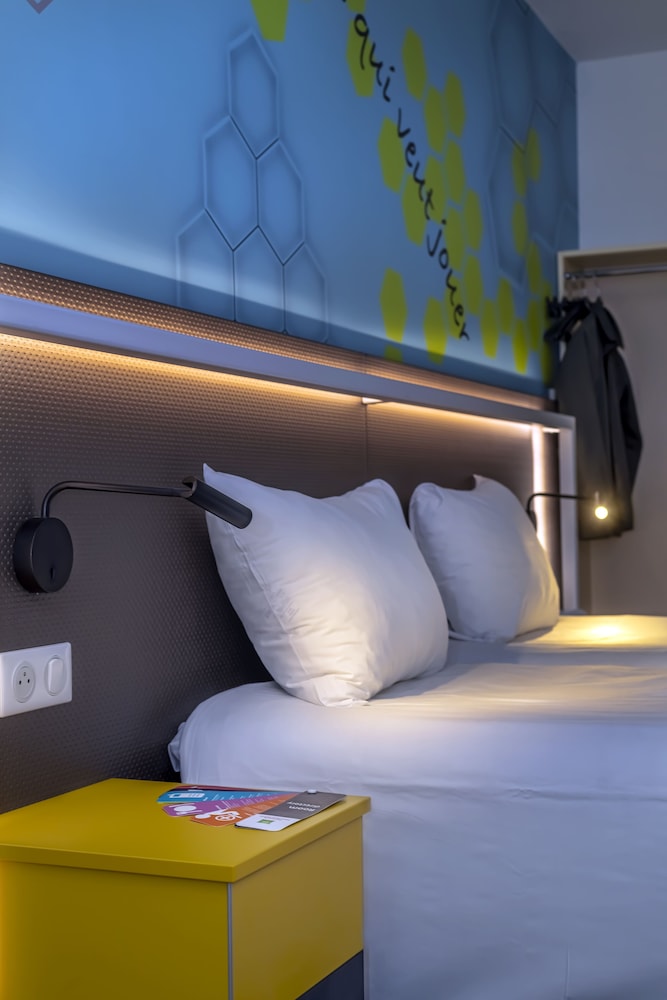 Habitación estándar con camas individuales del hotel Ibis Styles Strasbourg Stade De La Meinau. Foto 1
