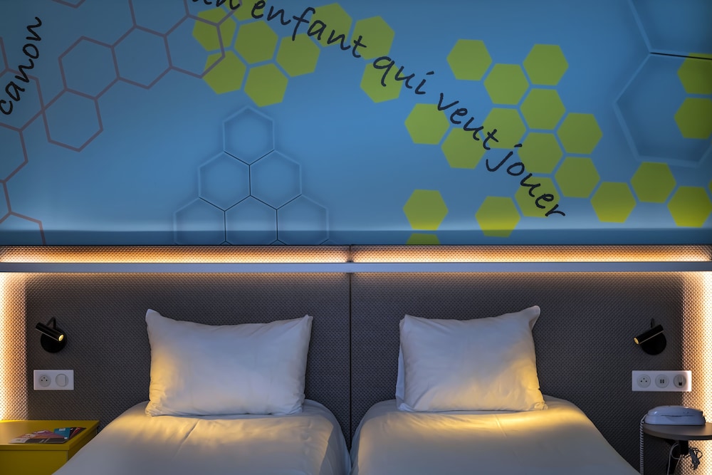 Habitación estándar con camas individuales del hotel Ibis Styles Strasbourg Stade De La Meinau. Foto 2