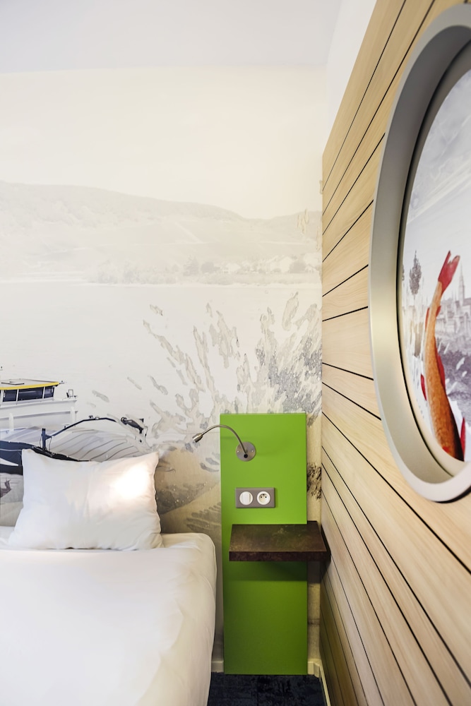 Habitación estándar con dos camas individuales del hotel Ibis Styles Strasbourg Avenue Du Rhin. Foto 1
