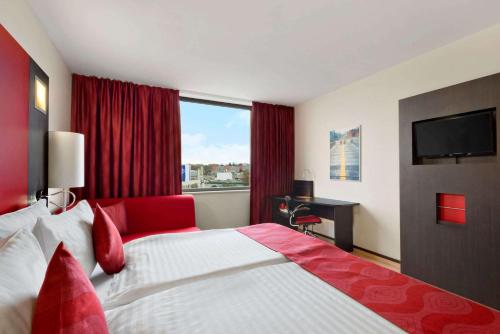Habitación Business con sofá cama - 1 cama extragrande - No fumadores del hotel Ramada Encore By Wyndham Geneva. Foto 1