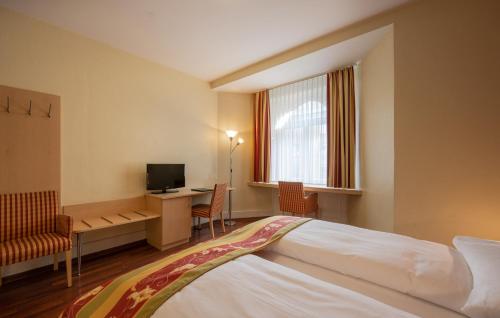 Habitación Doble Estándar del hotel De La Paix. Foto 3