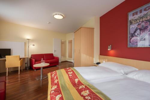 Habitación Triple del hotel De La Paix. Foto 9
