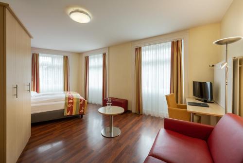 Habitación Triple del hotel De La Paix. Foto 10