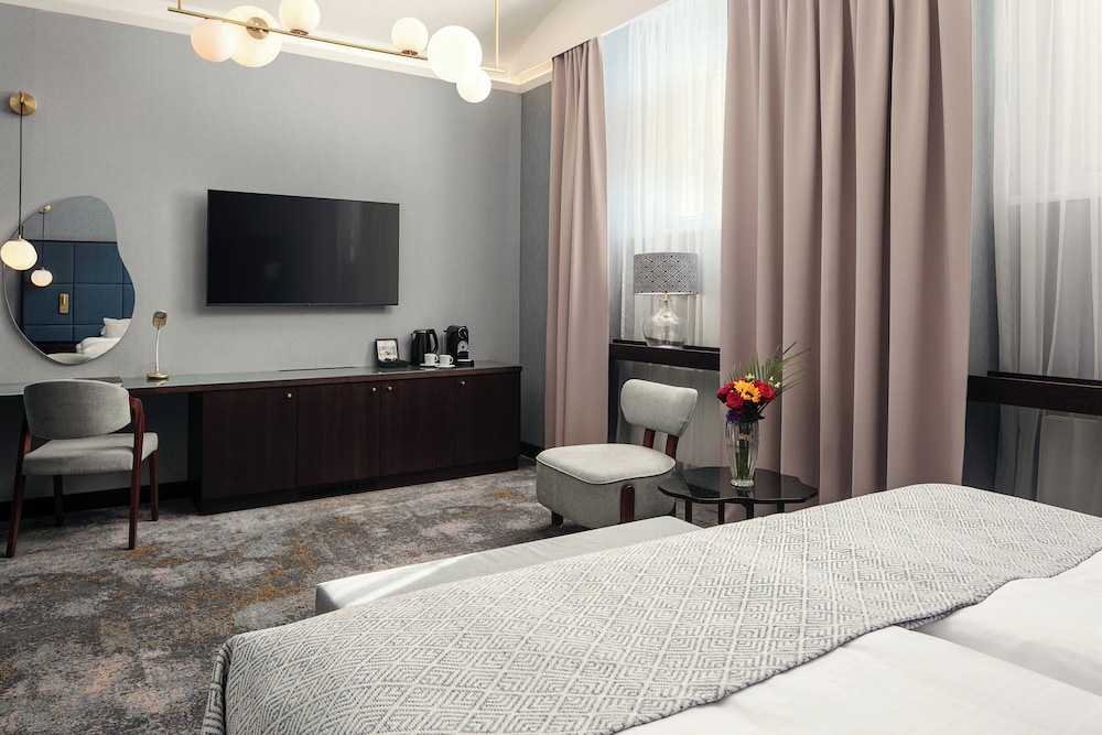 Habitación Deluxe con 1 cama doble o 2 individuales del hotel Kosher King David Prague. Foto 1