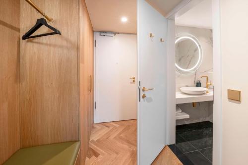 Residencia Grand - 1 cama extragrande del hotel Hilton Berlin. Foto 4