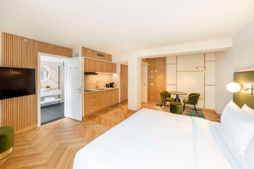 Alojamiento con cama extragrande del hotel Hilton Berlin. Foto 3