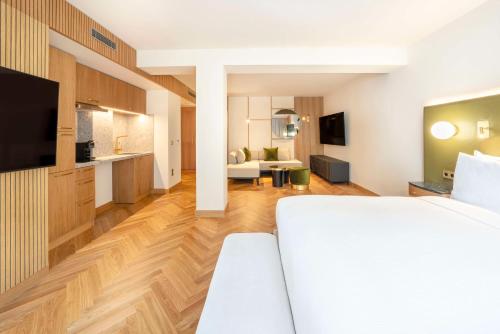 Alojamiento con cama extragrande del hotel Hilton Berlin. Foto 6