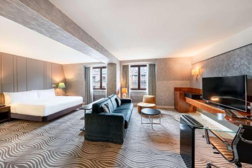 Habitación Deluxe con cama extragrande del hotel Hilton Berlin