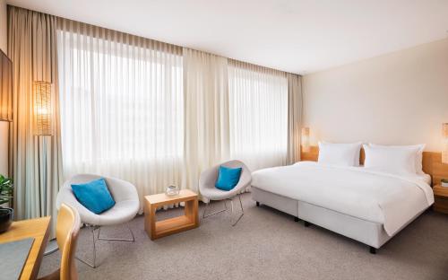 Deluxe King Room with Kudamm View del hotel Lindner Hotel Berlin Ku'damm. Foto 4