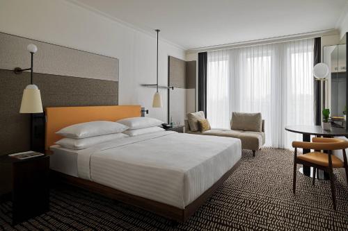 Habitación Deluxe - 1 cama extragrande del hotel Berlin Marriott. Foto 1