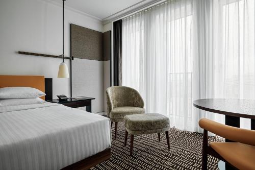 Habitación Deluxe - 2 camas dobles del hotel Berlin Marriott. Foto 1